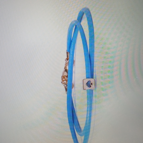 ππKate Spade Gold tone colored leather cord wrap bracelet. NWT and dust bag